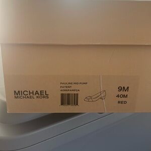 Red buckle shoes red patent